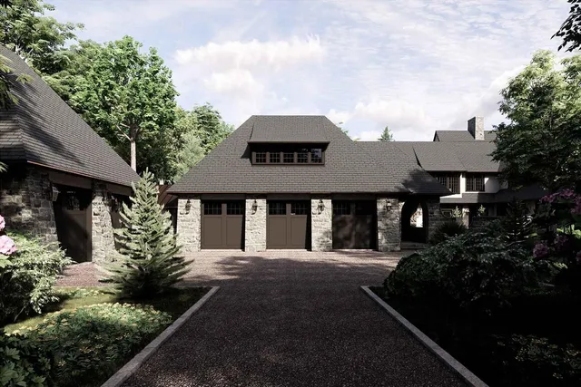 a front view of a house with garden