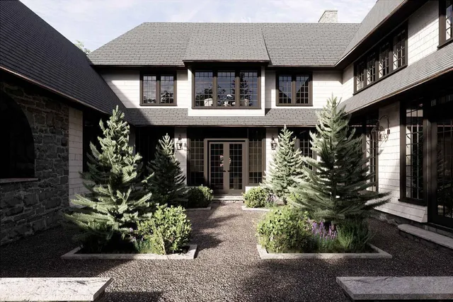 a house with yard in front of it