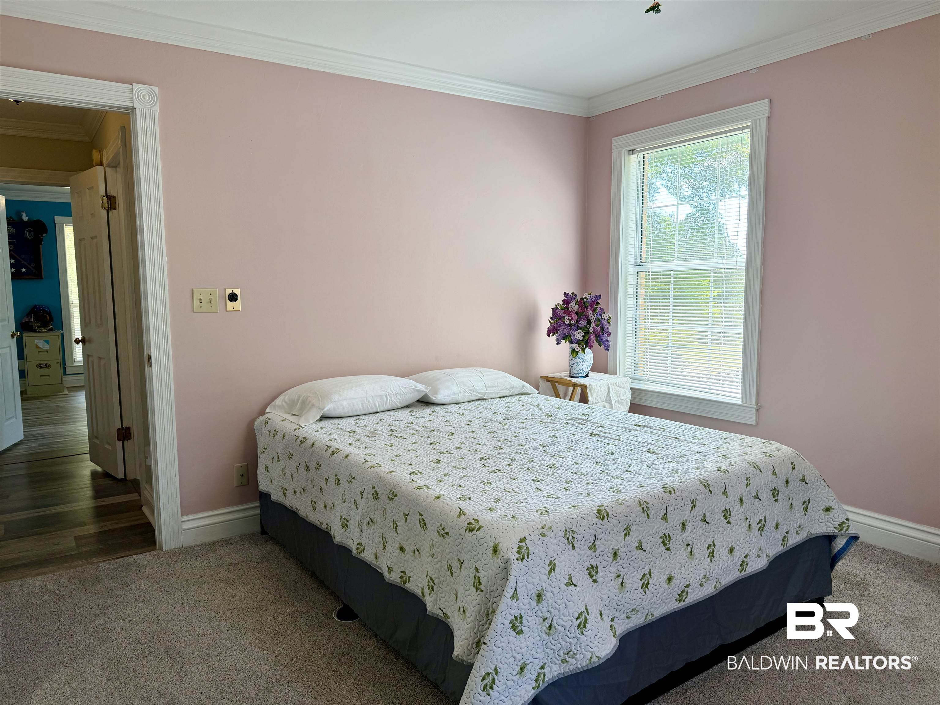 2944 Appleton Road Brewton, AL 36426 - Photo 23 of 65 Bedroom with ornamental molding and carpet flooring