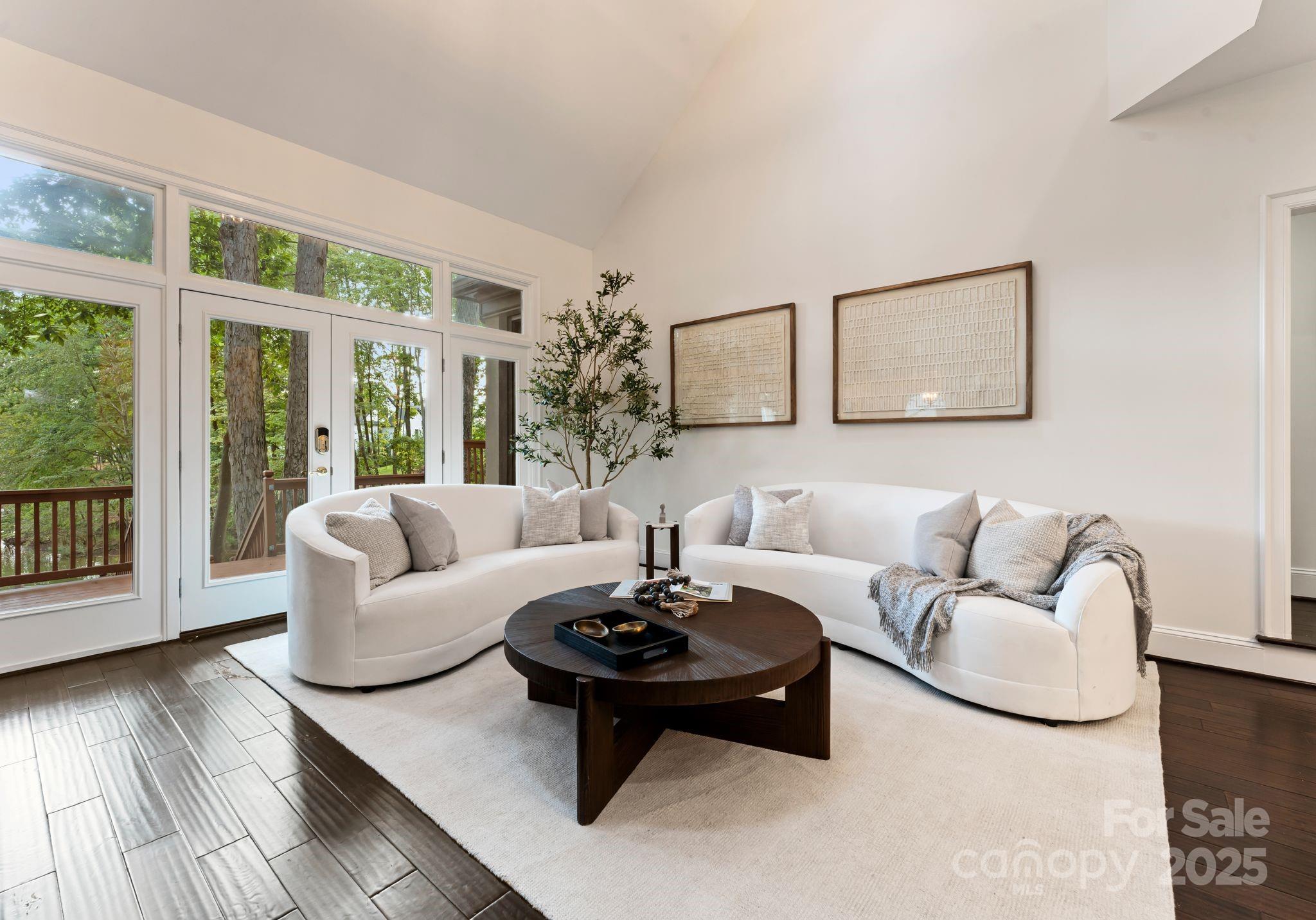 252 Greyfriars Road Mooresville, NC 28117 - Photo 1 of 46 a living room with furniture and a large window