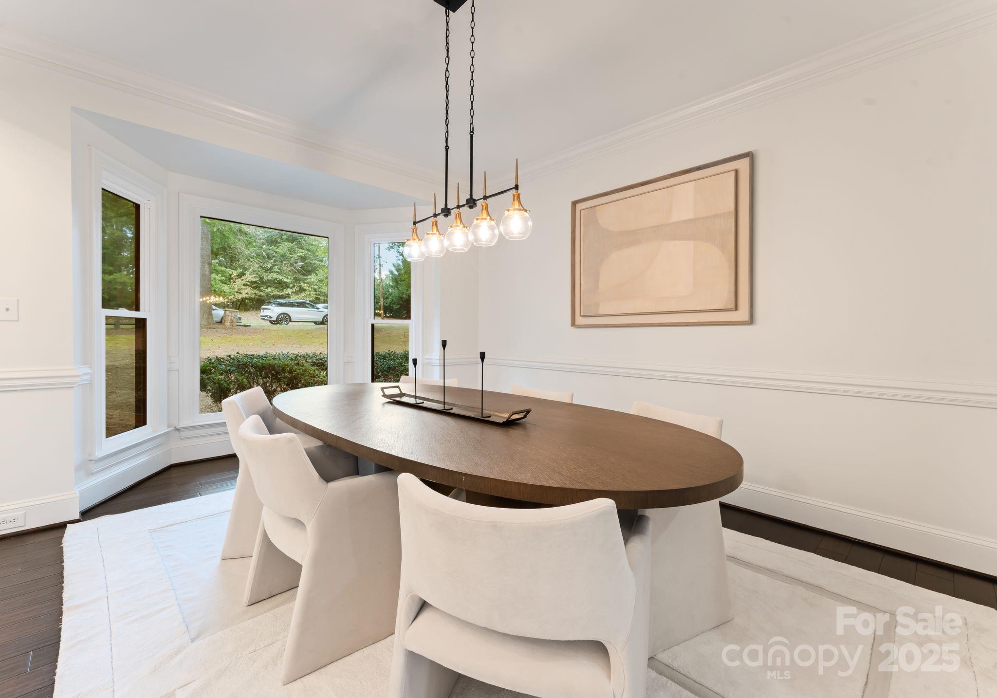 252 Greyfriars Road Mooresville, NC 28117 - Photo 11 of 46 a view of a dining room with furniture window and outside view