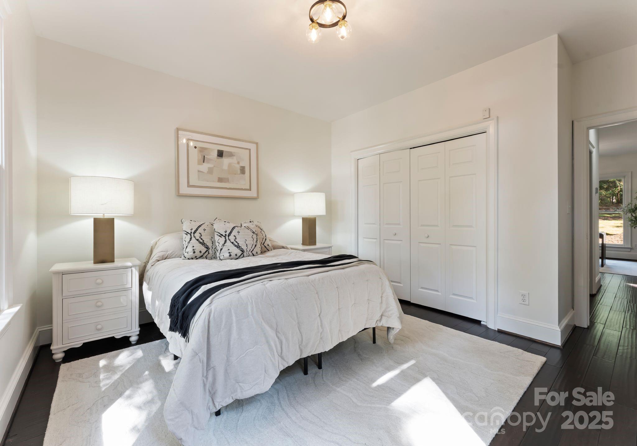 252 Greyfriars Road Mooresville, NC 28117 - Photo 23 of 46 a bedroom with a bed and a window