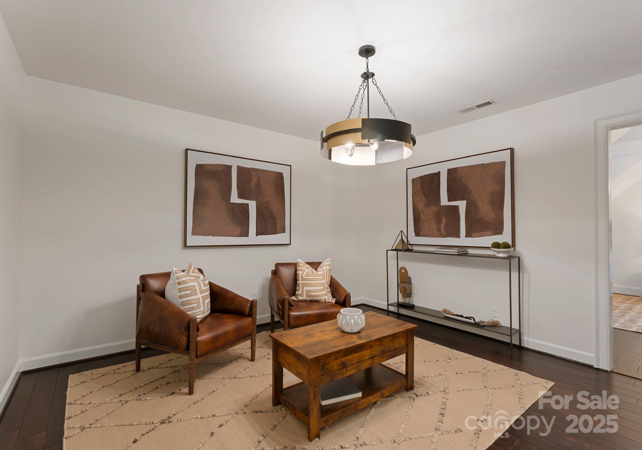 252 Greyfriars Road Mooresville, NC 28117 - Photo 31 of 46 a living room with furniture and a window
