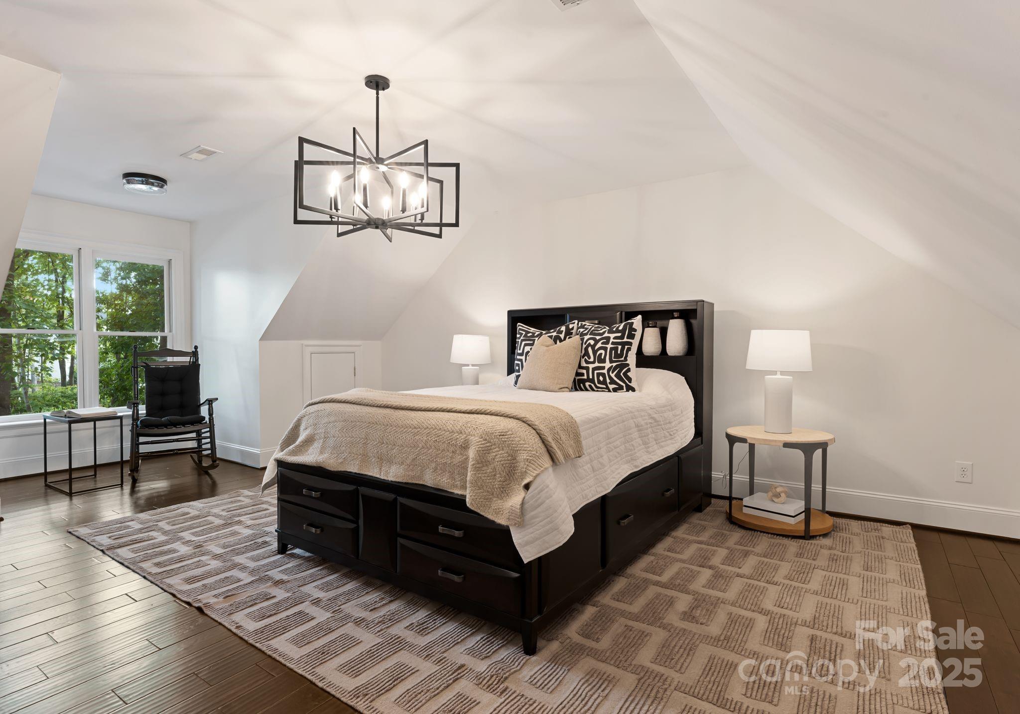 252 Greyfriars Road Mooresville, NC 28117 - Photo 33 of 46 a bedroom with a bed and window