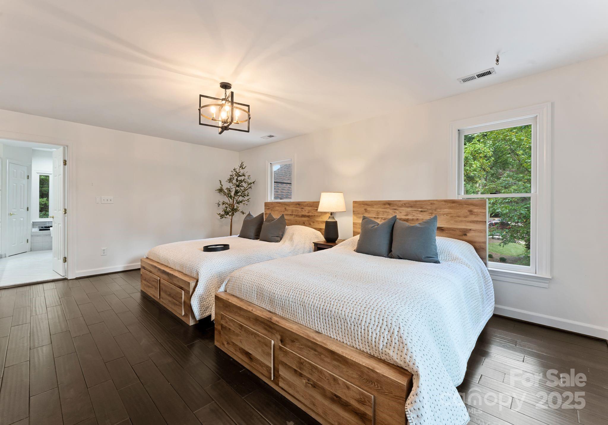 252 Greyfriars Road Mooresville, NC 28117 - Photo 36 of 46 a bedroom with bed and window