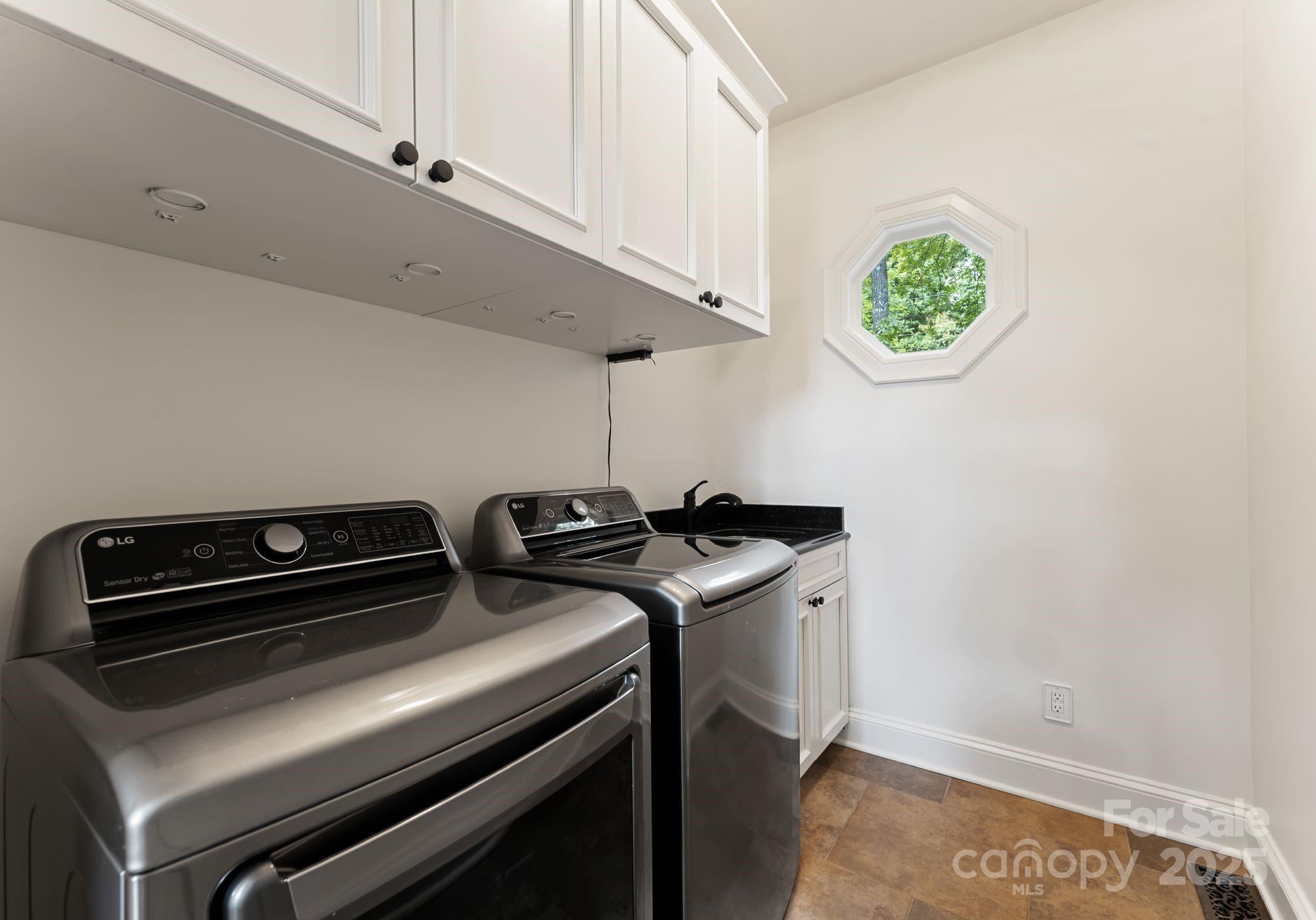 252 Greyfriars Road Mooresville, NC 28117 - Photo 37 of 46 a utility room with dryer and washer