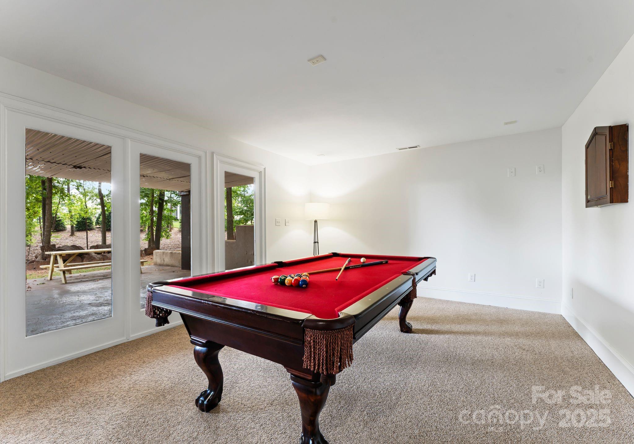 252 Greyfriars Road Mooresville, NC 28117 - Photo 39 of 46 a room with pool table and windows