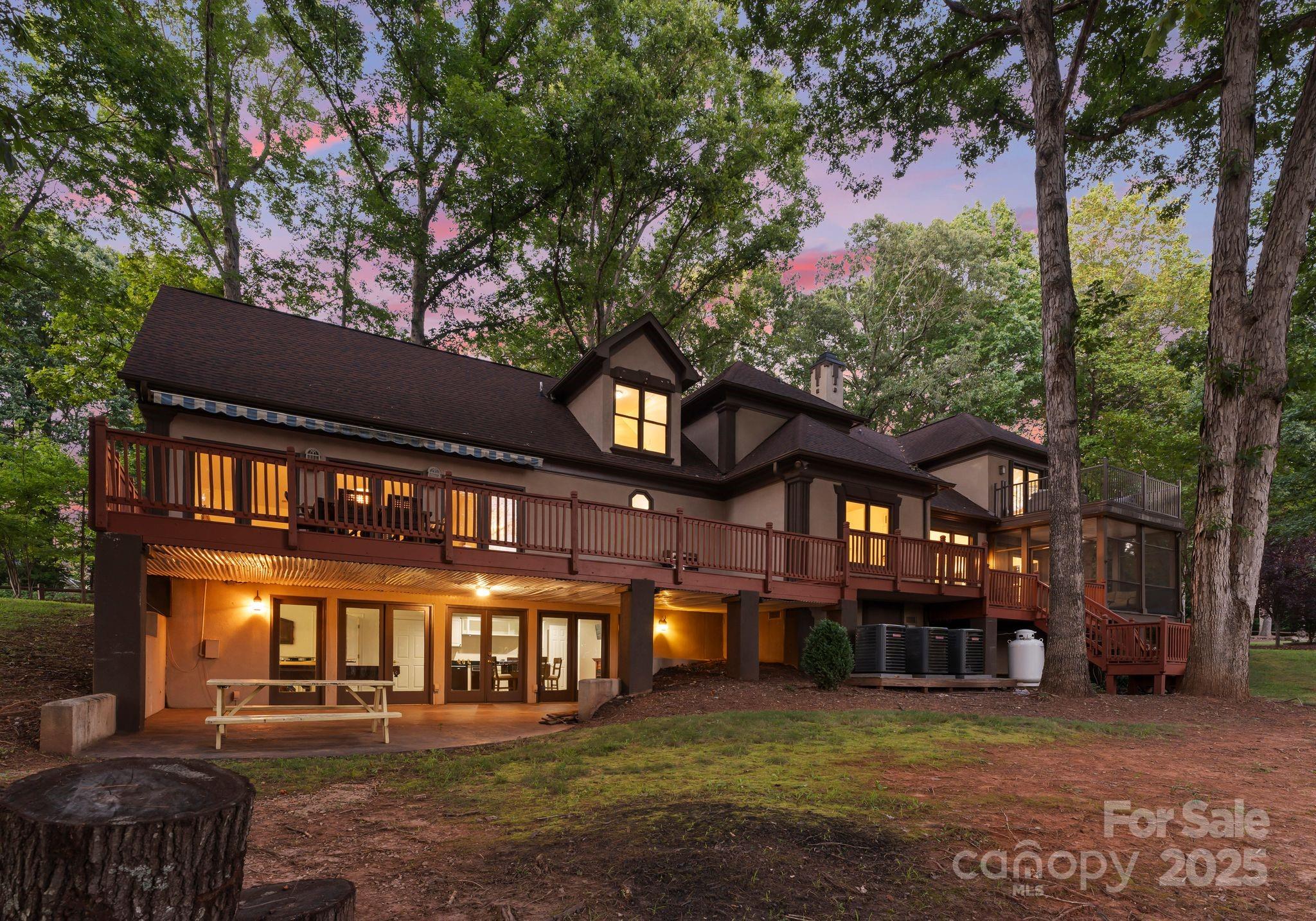 252 Greyfriars Road Mooresville, NC 28117 - Photo 5 of 46 a front view of a building with a garden