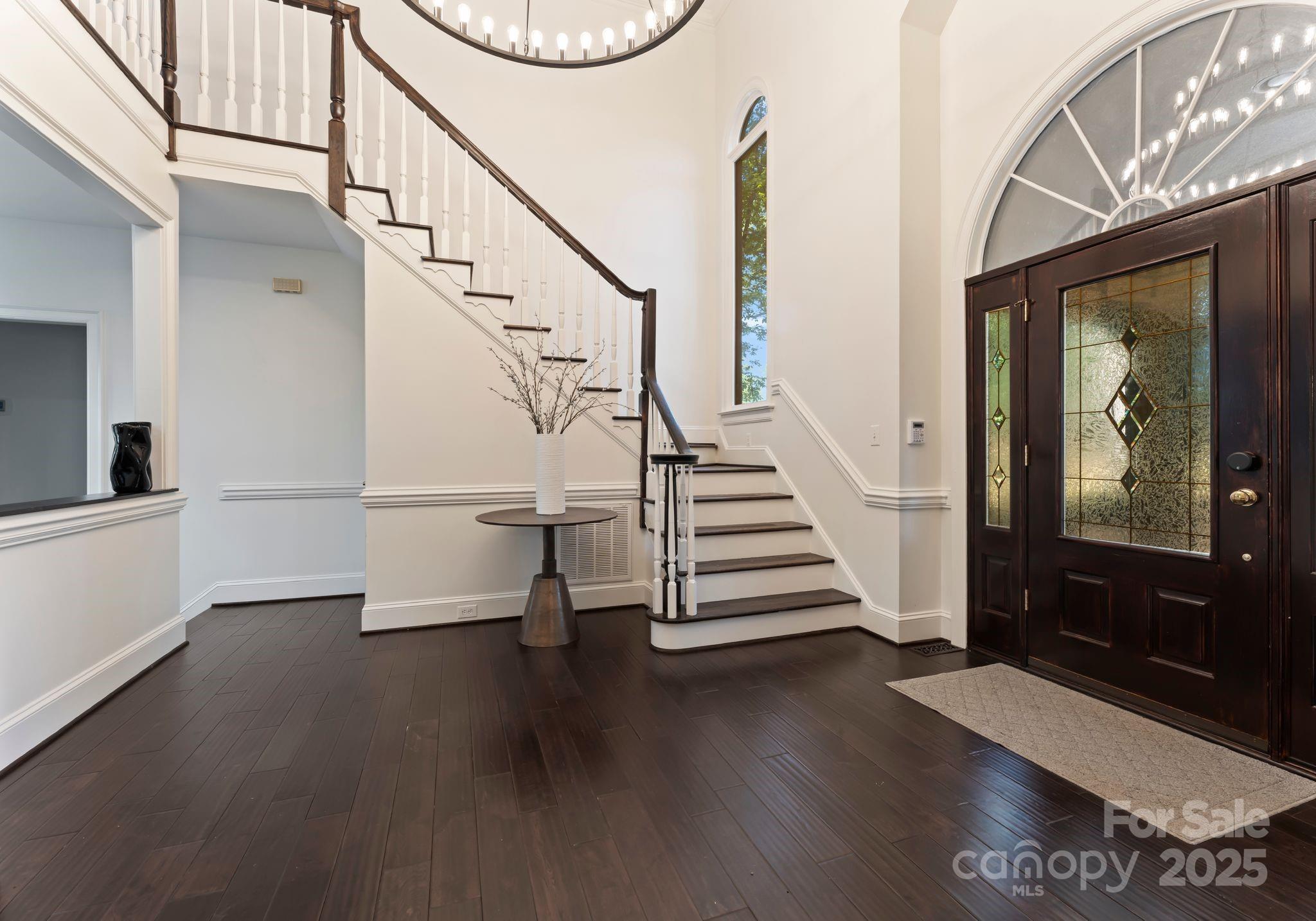 252 Greyfriars Road Mooresville, NC 28117 - Photo 7 of 46 a view of entryway with wooden floor