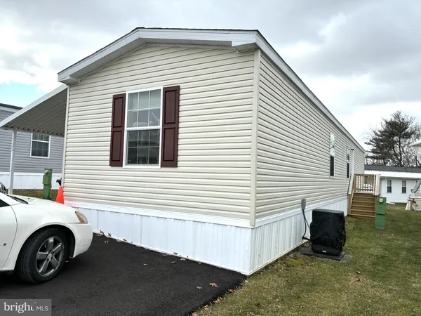 a utility room with a car parked car