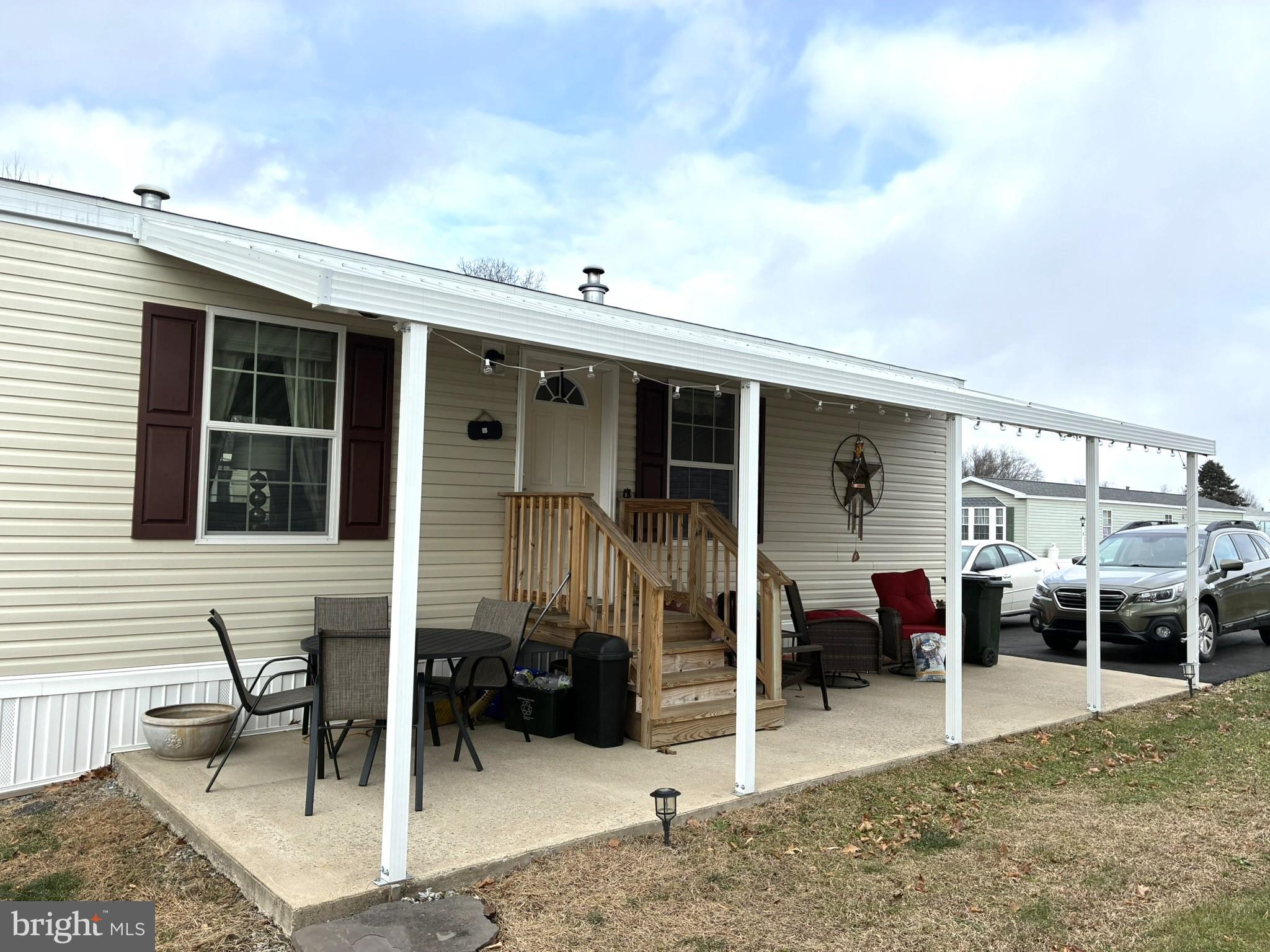 135 Hillside Lane Howard, PA 16841 - Photo 2 of 19 a view of a house with patio