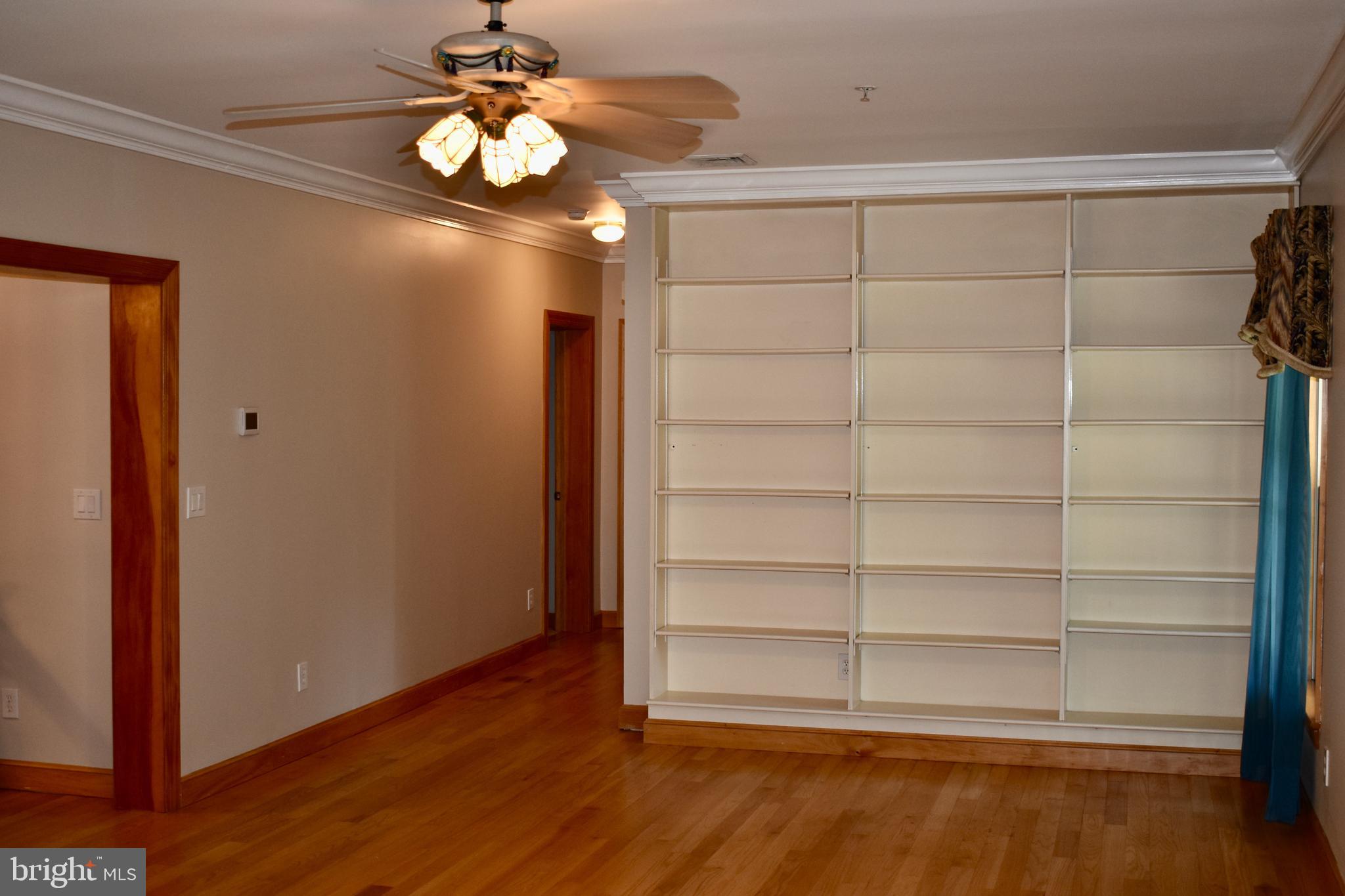 15745 Baden Naylor Road Brandywine, MD 20613 - Photo 14 of 59 Built-in library or curio shelves in living/family