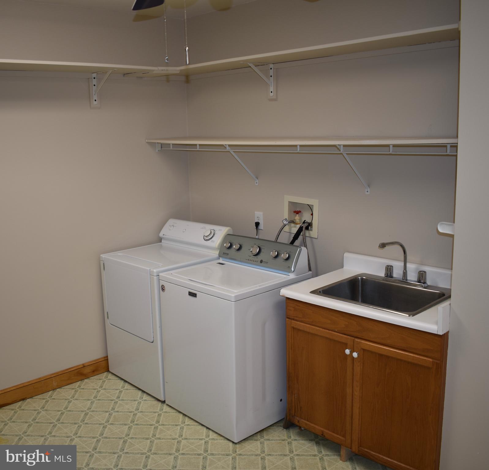 15745 Baden Naylor Road Brandywine, MD 20613 - Photo 21 of 59 Washer, dryer and new laundry sink.