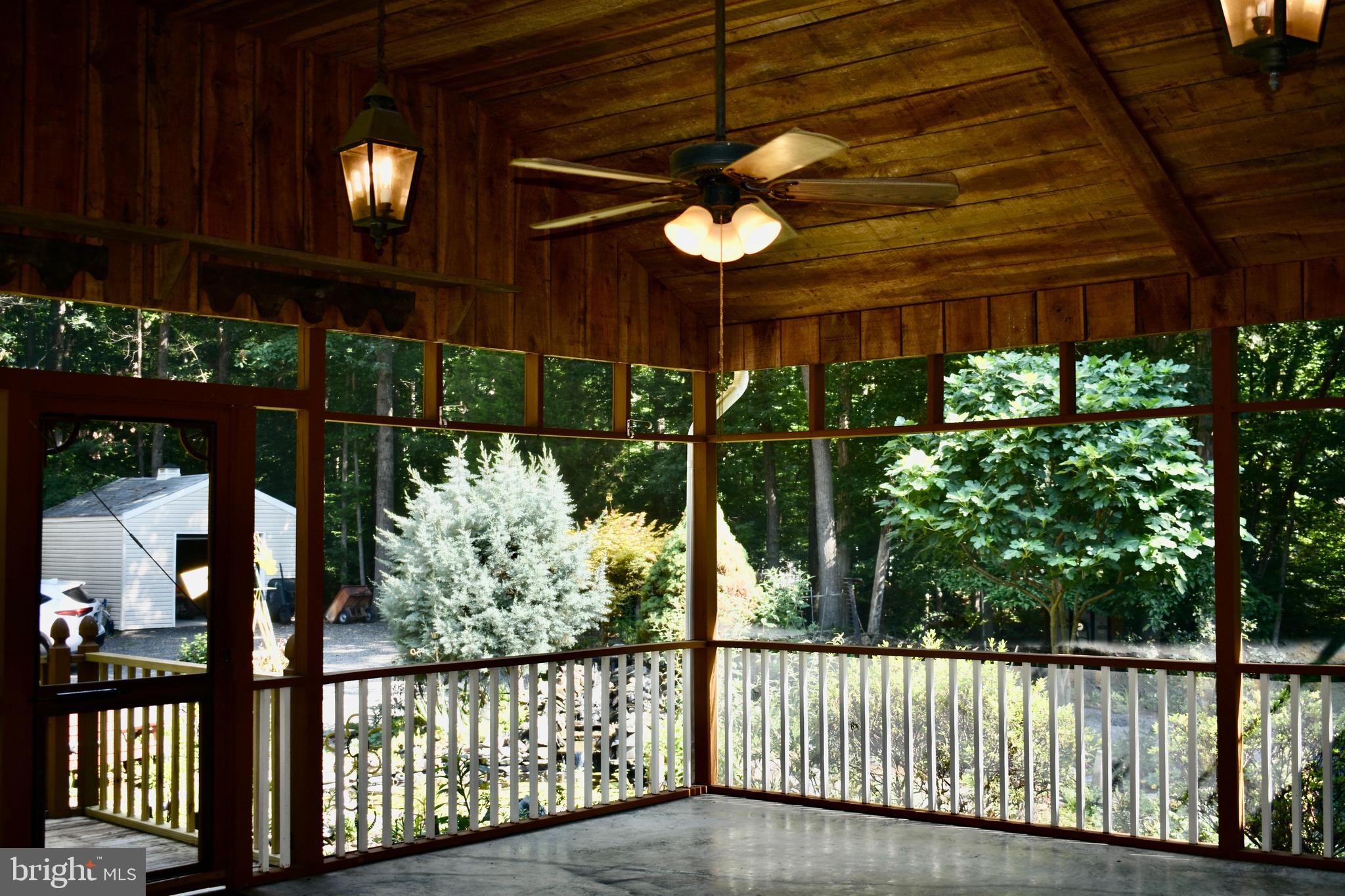 15745 Baden Naylor Road Brandywine, MD 20613 - Photo 43 of 59 Screened porch on rear to view fish pond