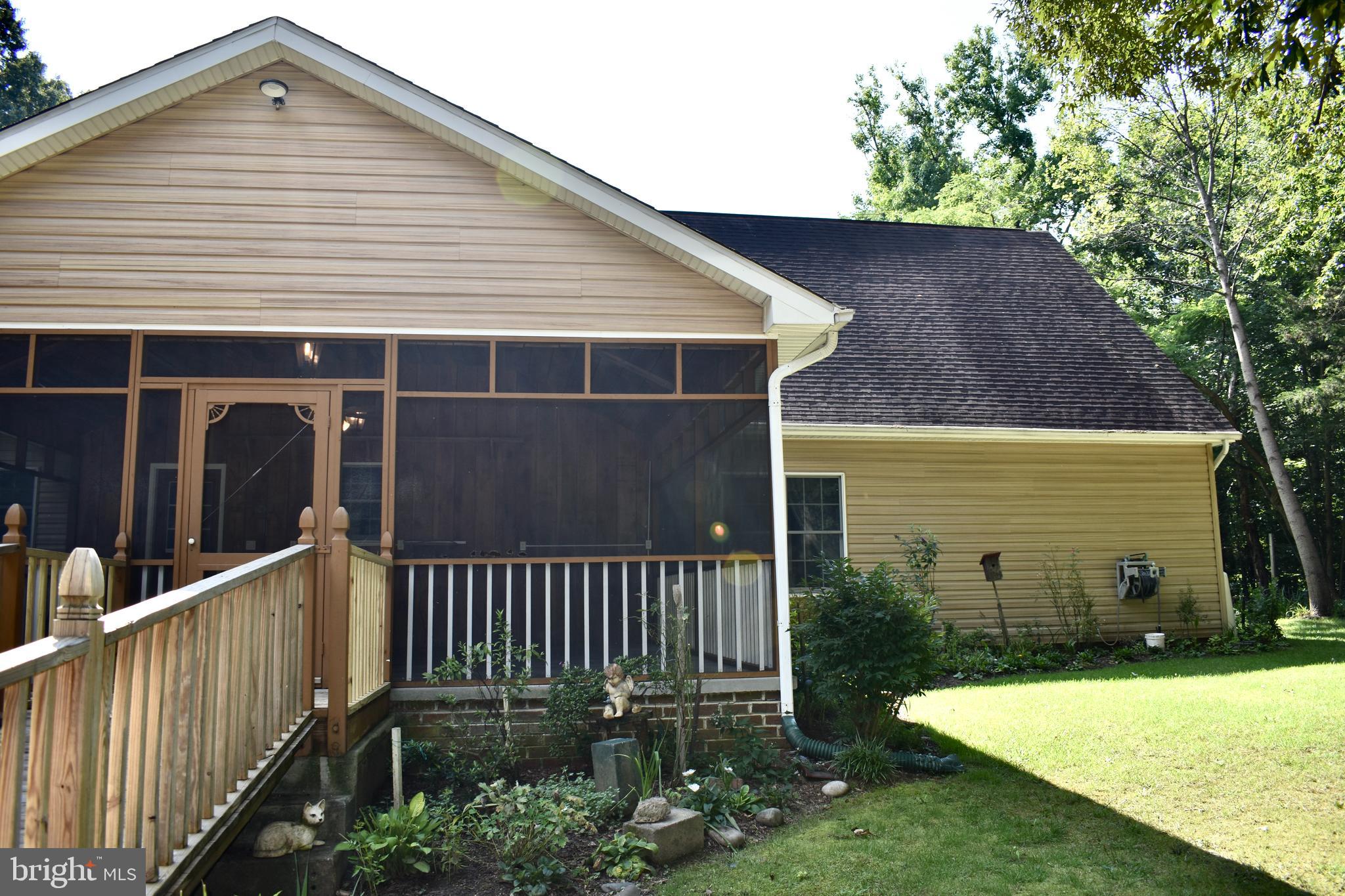 15745 Baden Naylor Road Brandywine, MD 20613 - Photo 47 of 59 Sturdy permanent ramp to porch & kitchen entrance