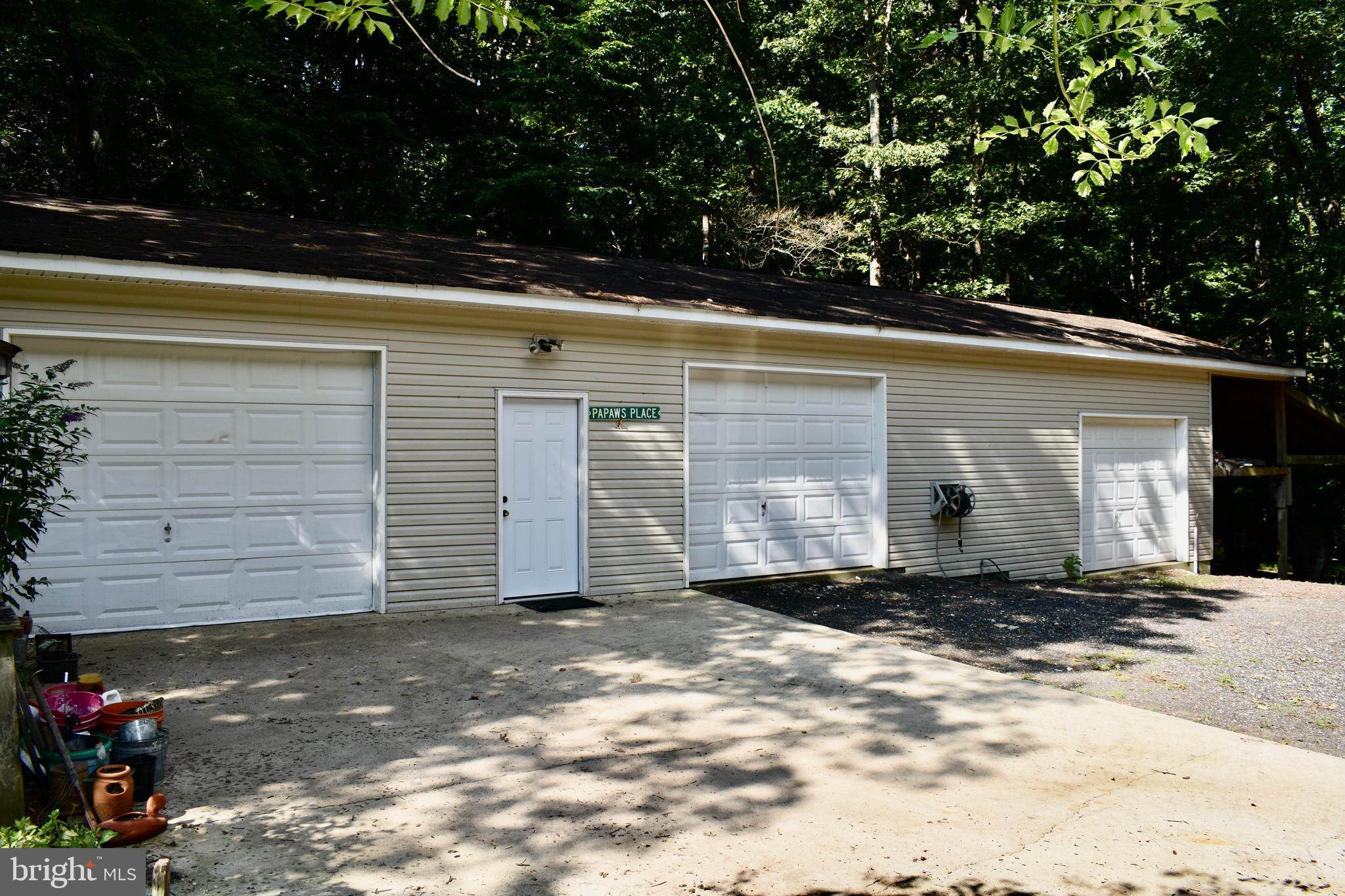 15745 Baden Naylor Road Brandywine, MD 20613 - Photo 49 of 59 Detached garage--three bays, workshops & overhang