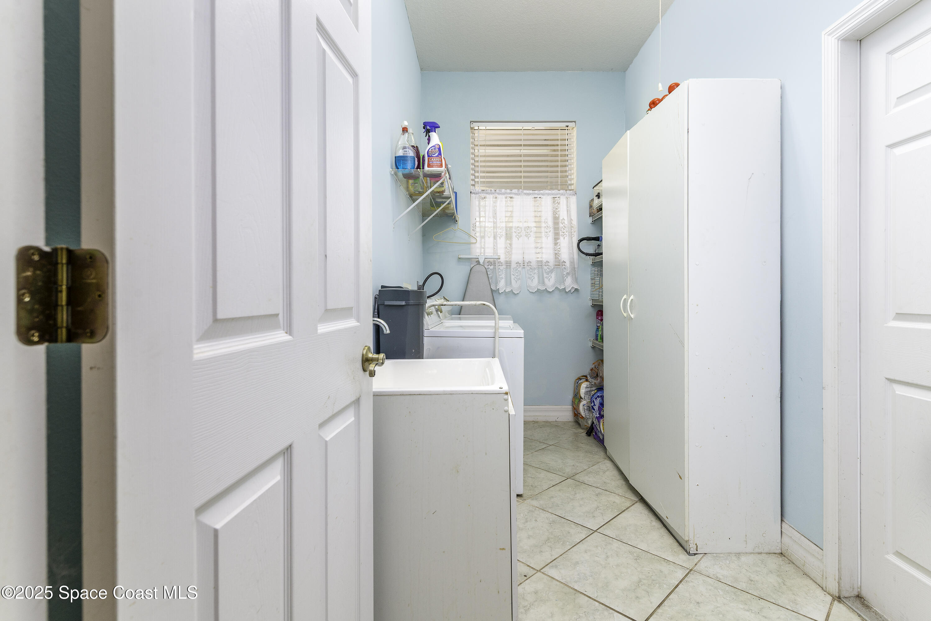 386 Northwest Valencia Road Melbourne, FL 32904 - Photo 31 of 50 Indoor Laundry Room