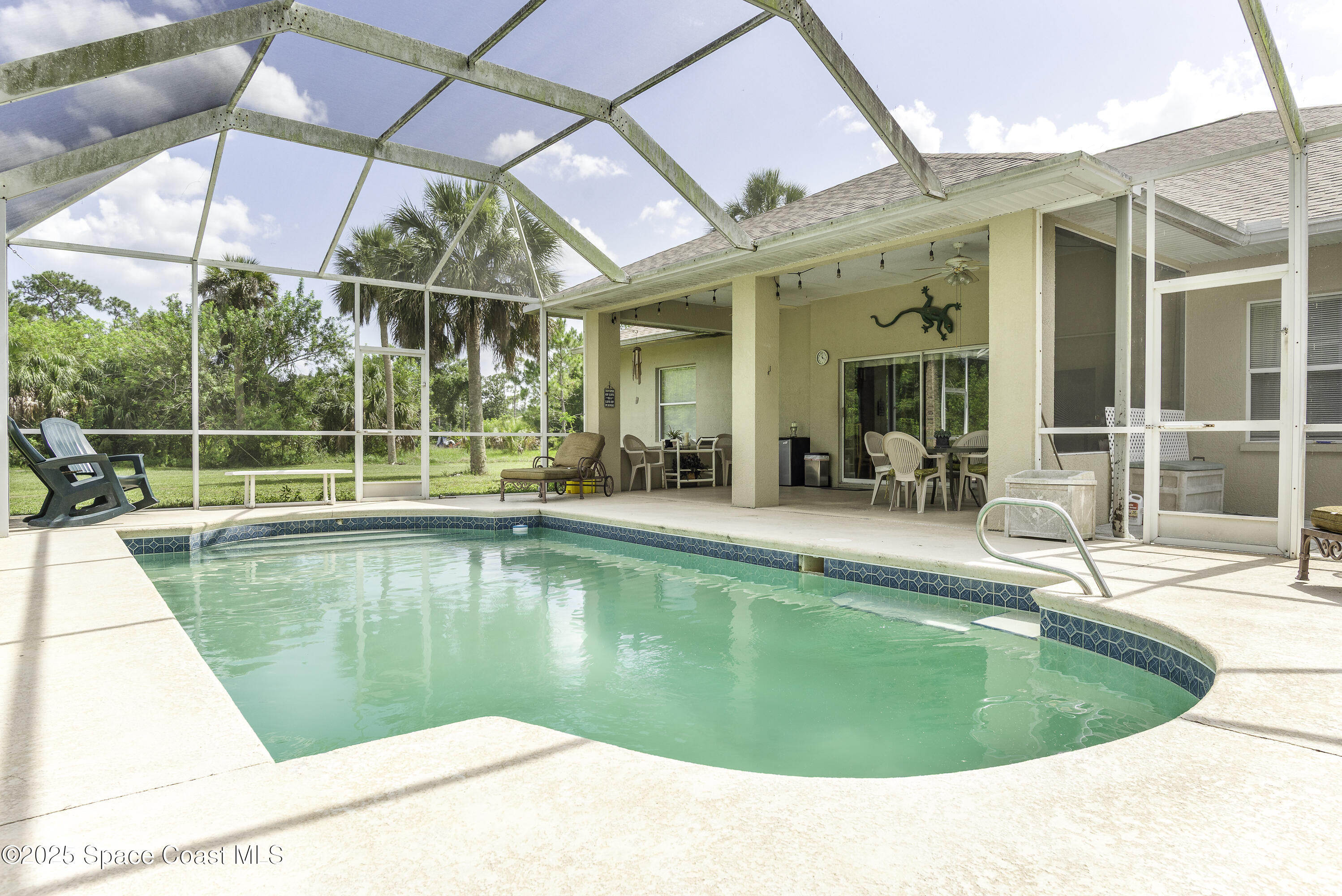 386 Northwest Valencia Road Melbourne, FL 32904 - Photo 43 of 50 38 x 37 Pool Deck & Patio