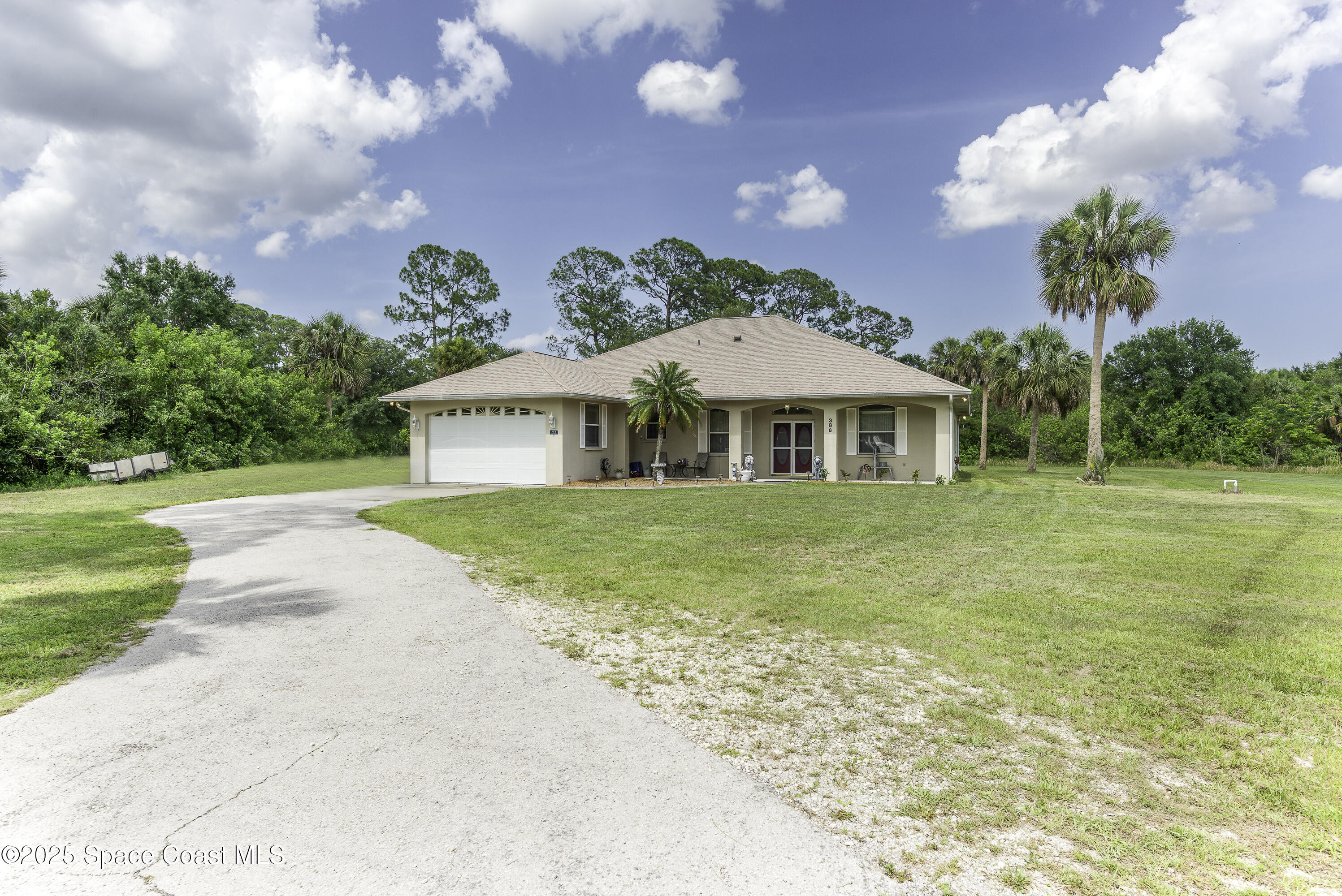 386 Northwest Valencia Road Melbourne, FL 32904 - Photo 49 of 50 Deep Garage Accommodates 4 Cars!