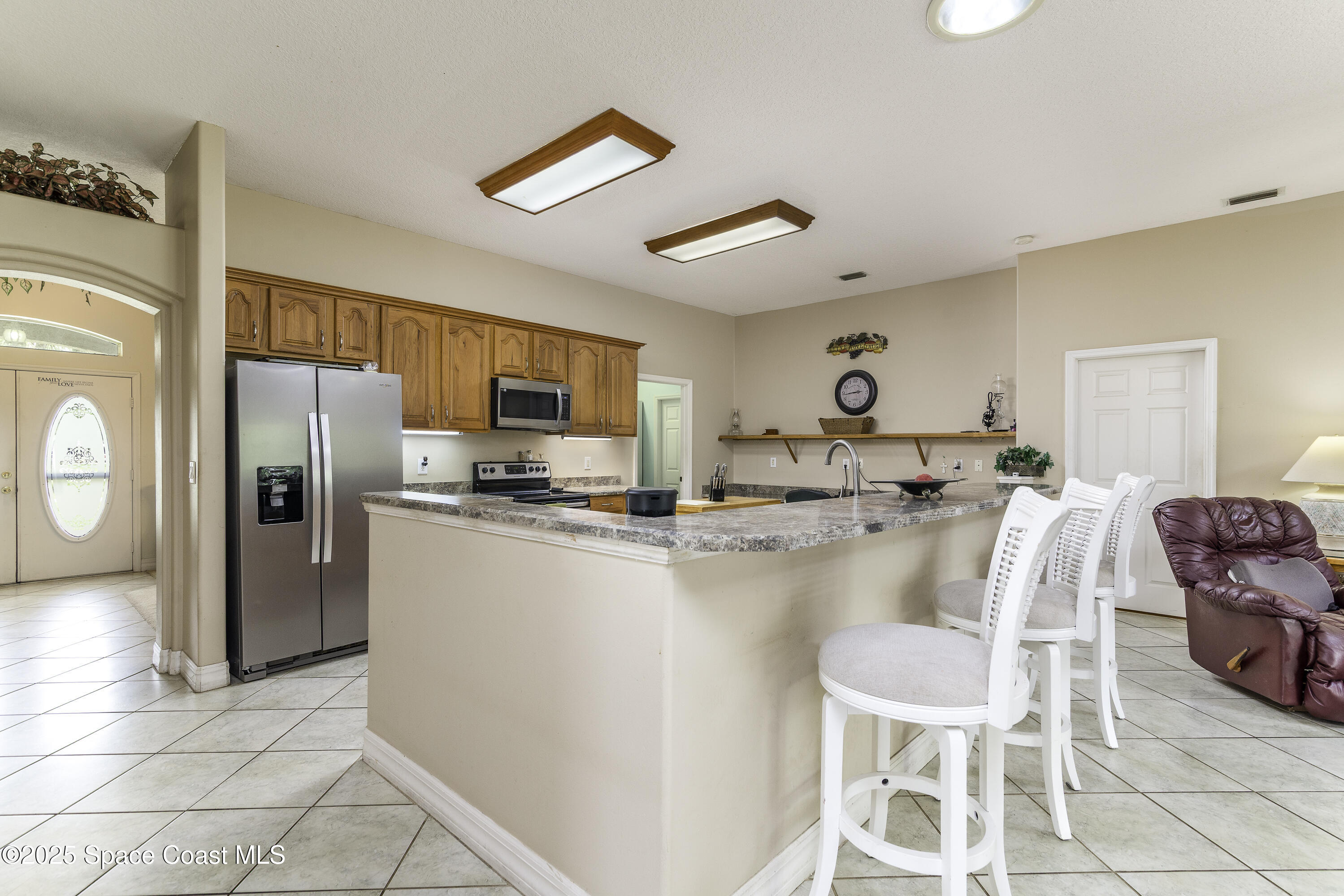 386 Northwest Valencia Road Melbourne, FL 32904 - Photo 9 of 50 Casual Meals & Conversation