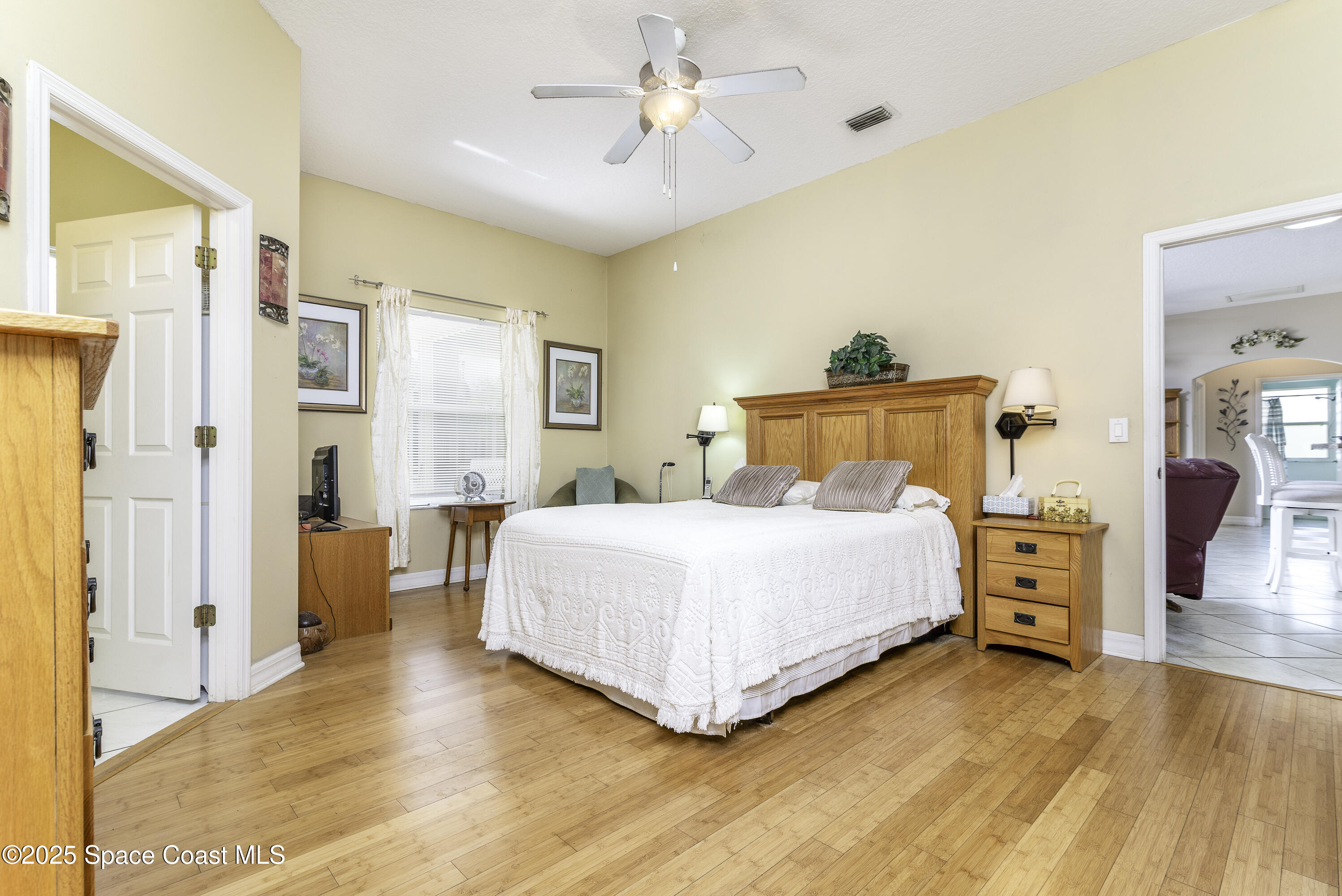 386 Northwest Valencia Road Melbourne, FL 32904 - Photo 10 of 50 Bamboo Flooring In Primary Ensuite