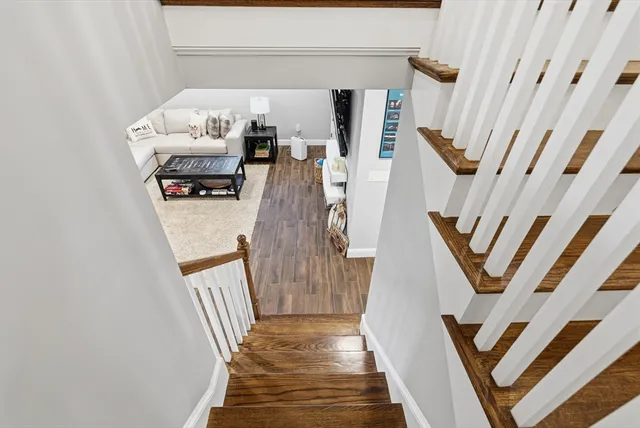 a view of stairs and furniture