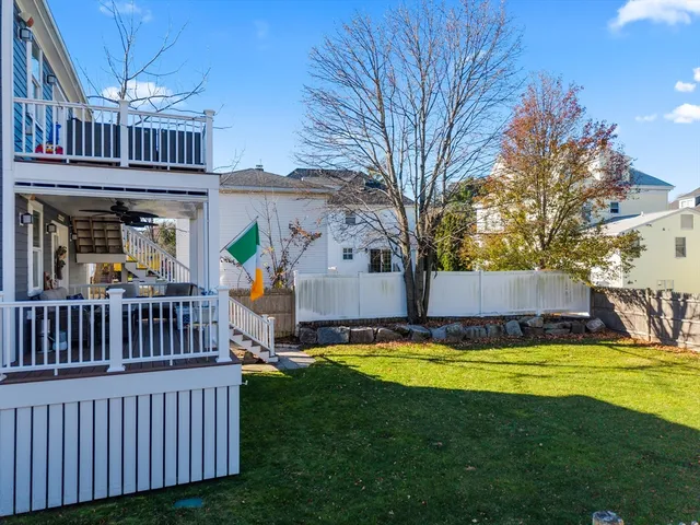 a view of swimming pool with deck and patio