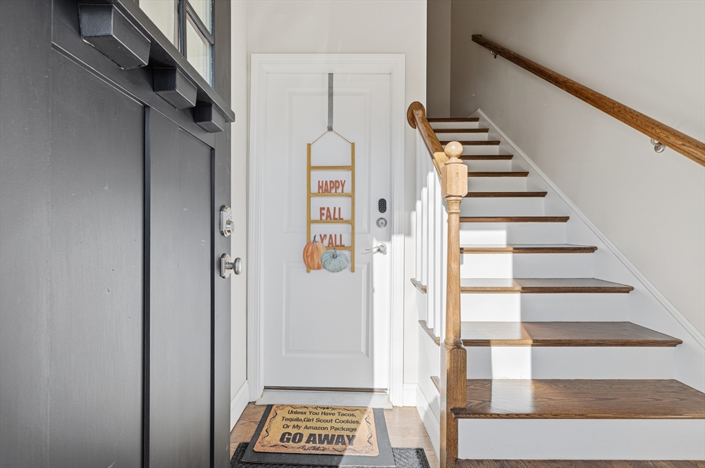 491 Washington Street, Unit 1 Braintree, MA 02184 - Photo 4 of 42 a view of an entryway with staircase