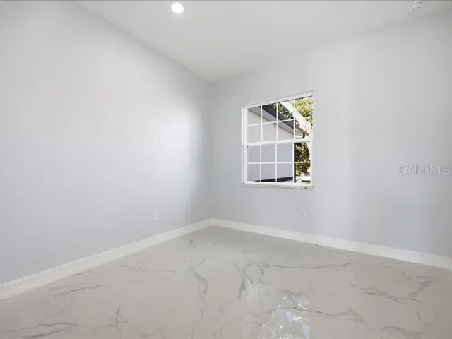 an empty room with a window