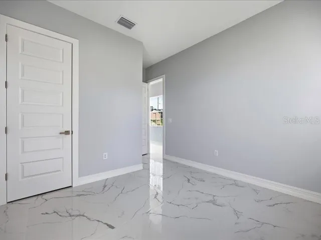 an empty room with closet