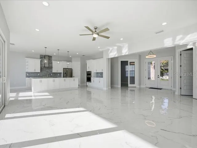 a view of a kitchen and a window