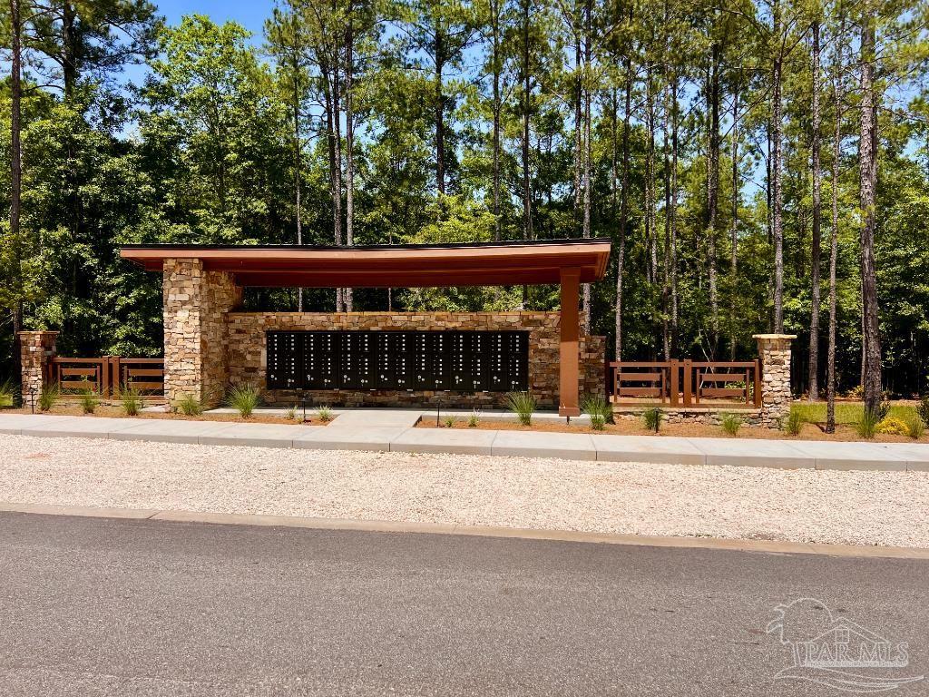 Lot 16 Naturewalk Drive Milton, FL 32571 - Photo 25 of 35 a view of a house with a white fence
