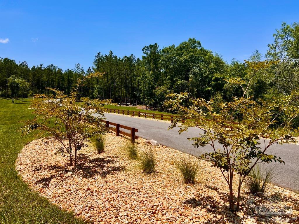 Lot 16 Naturewalk Drive Milton, FL 32571 - Photo 29 of 35 a view of a yard with wooden fence