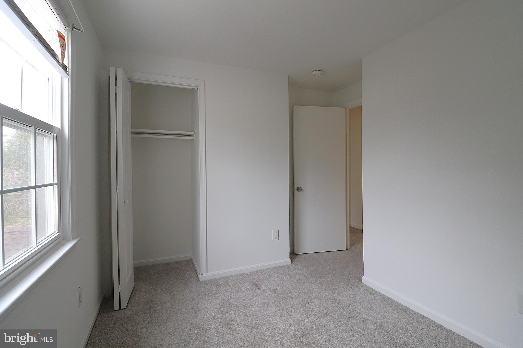 138 Sharpstead Lane Gaithersburg, MD 20878 - Photo 17 of 36 a view of an empty room with a window