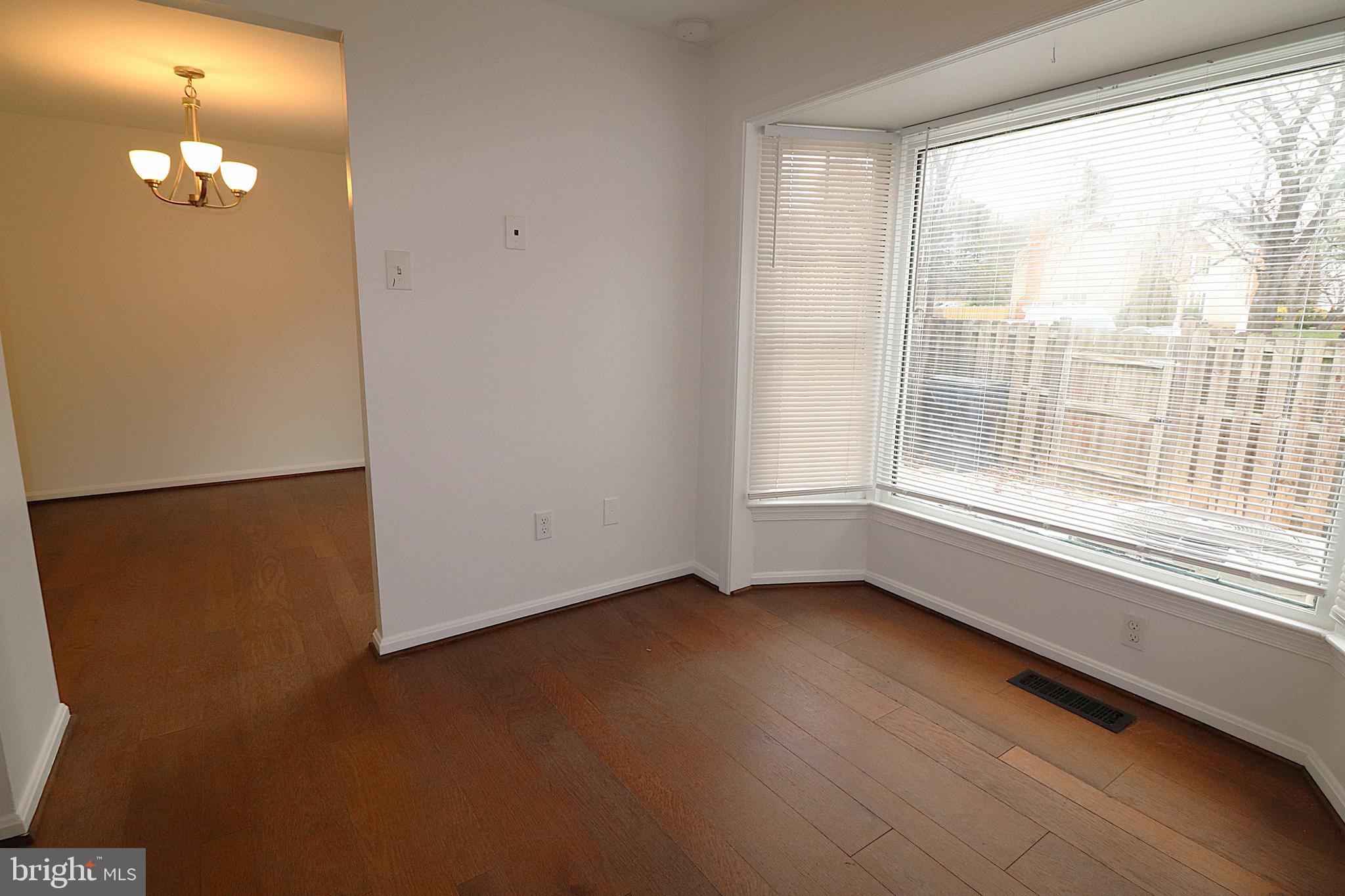 138 Sharpstead Lane Gaithersburg, MD 20878 - Photo 9 of 36 a view of an empty room with a window