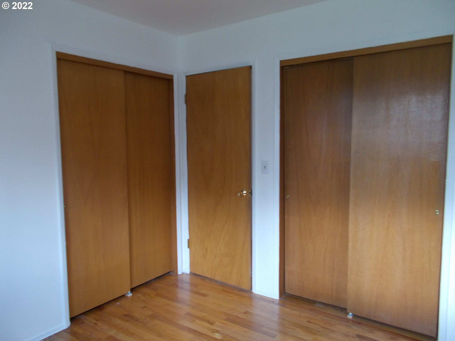 1388 Southwest 39th Street Pendleton, OR 97801 - Photo 16 of 22 an empty room with wooden floor and closet