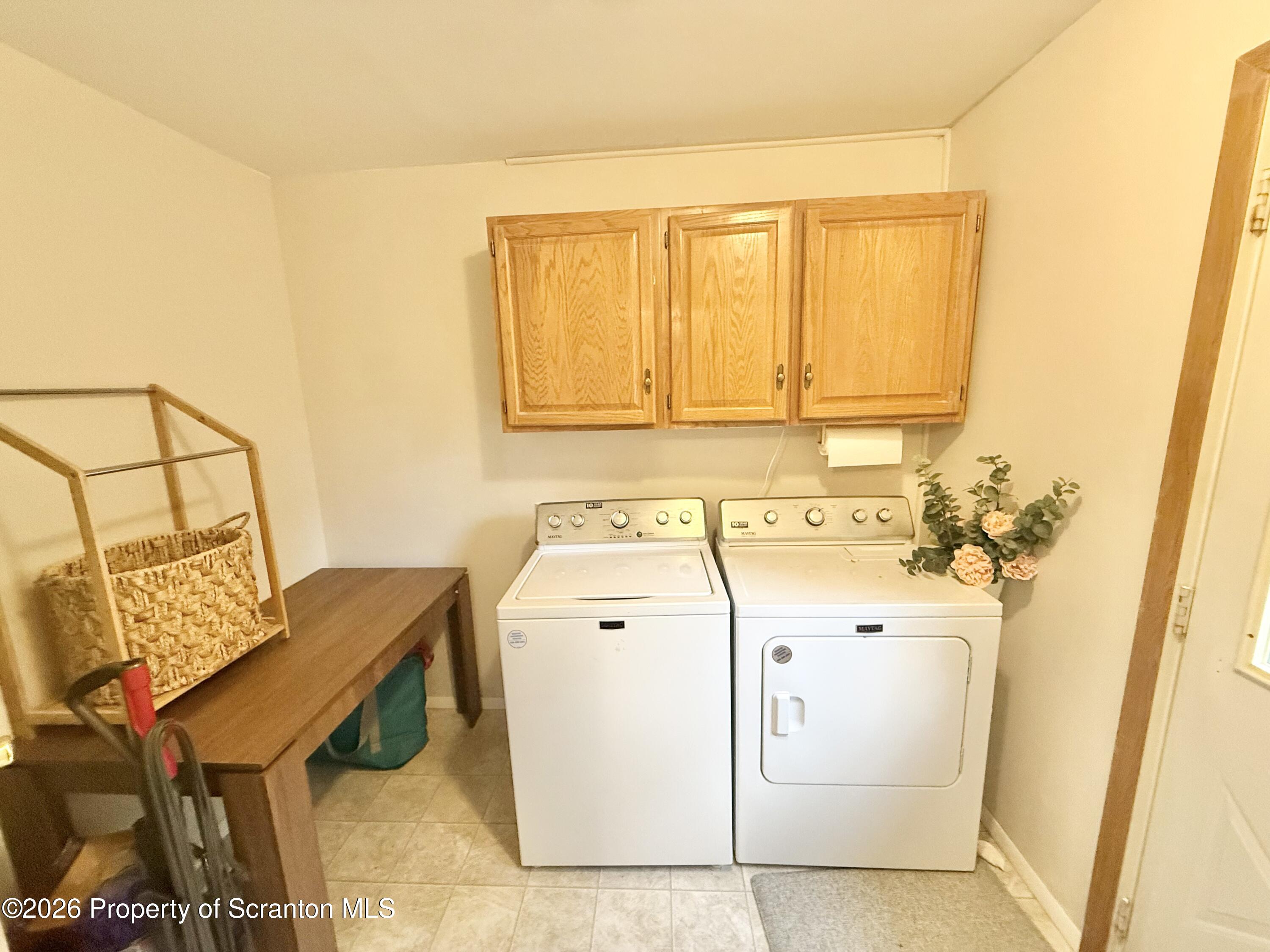 220 Brinkman Road Brackney, PA 18812 - Photo 11 of 32 a utility room with dryer and washer
