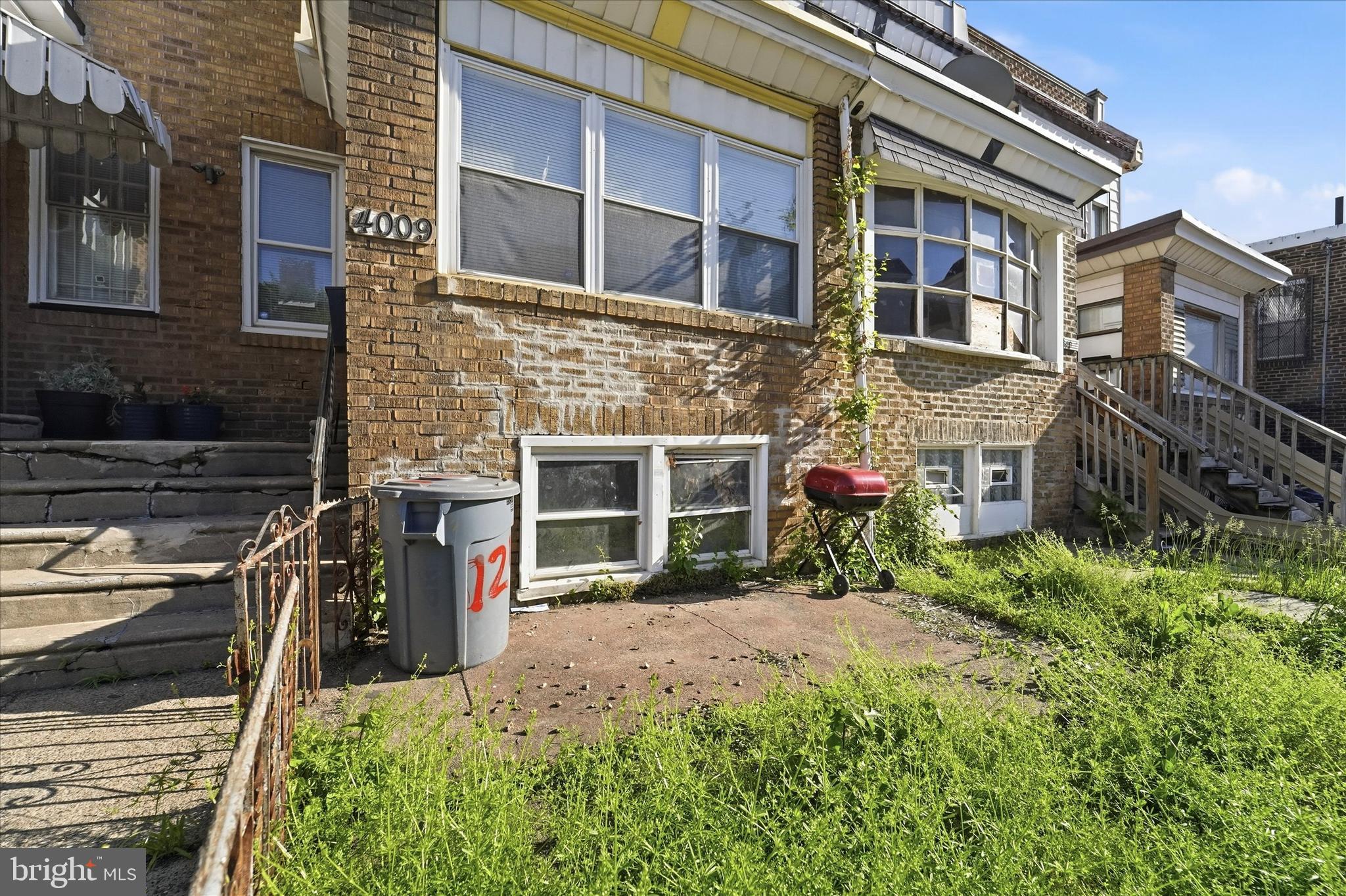 4009 Brown Street Philadelphia, PA 19104 - Photo 12 of 30 a front view of a house with a yard