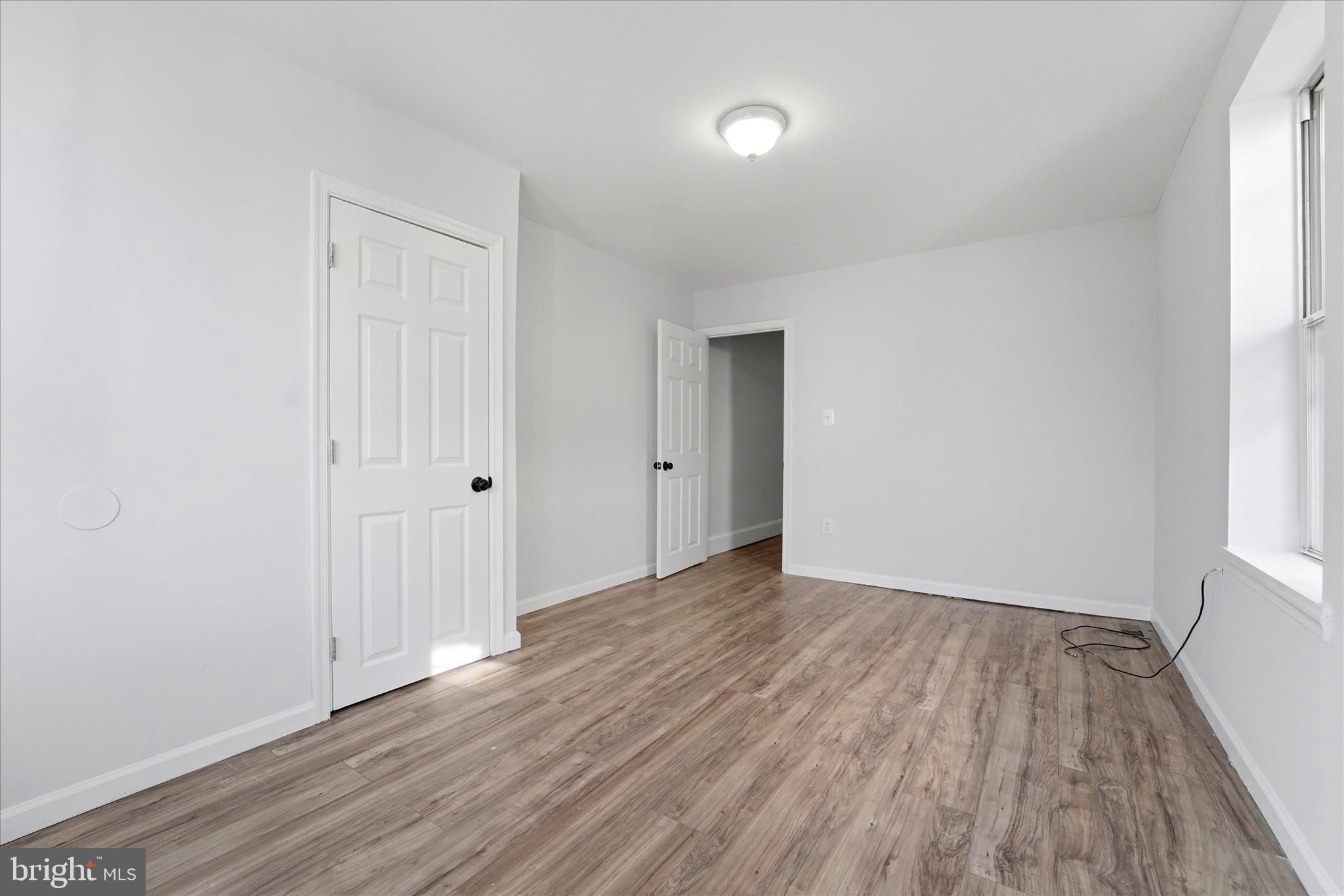 4009 Brown Street Philadelphia, PA 19104 - Photo 22 of 30 an empty room with wooden floor