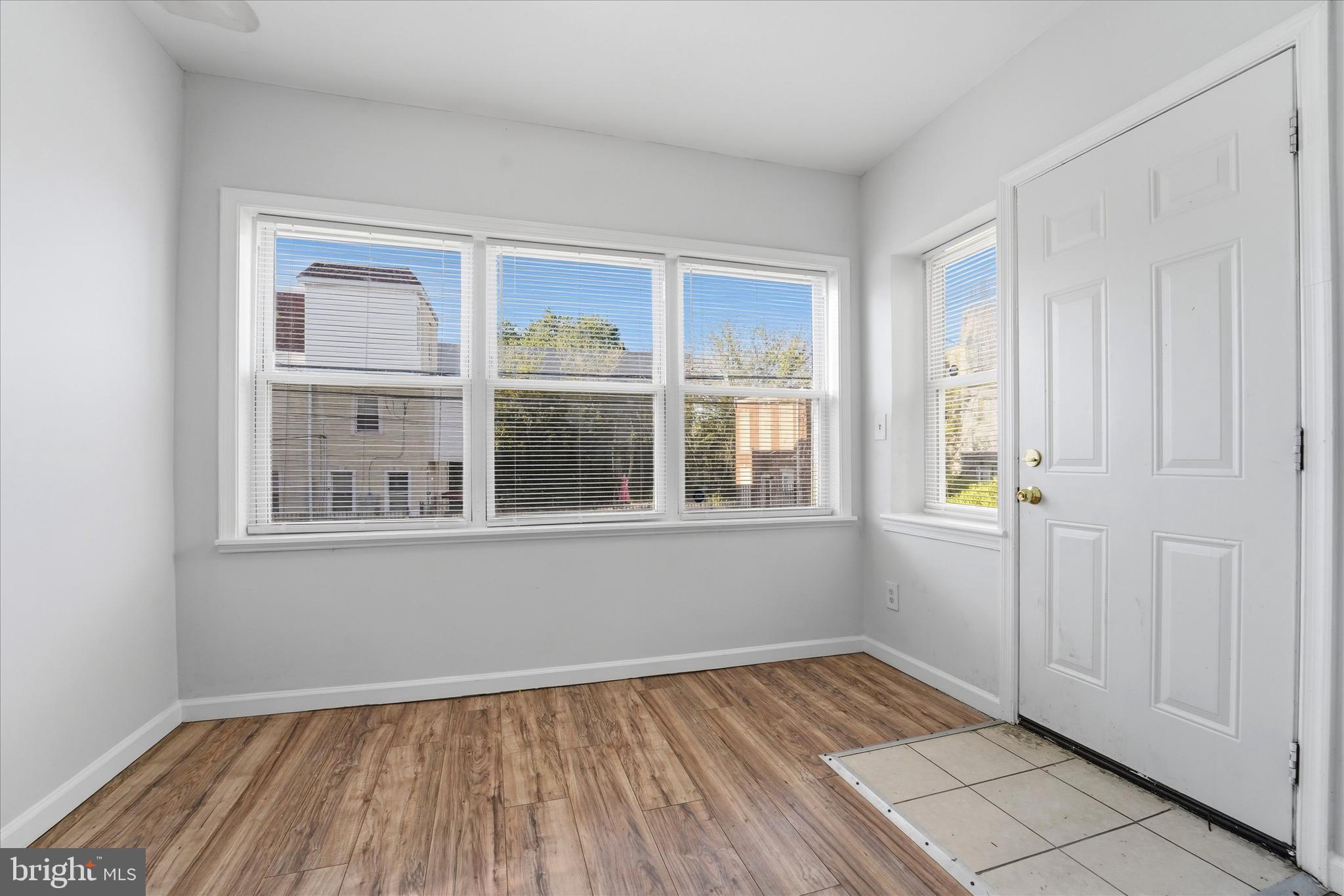 4009 Brown Street Philadelphia, PA 19104 - Photo 3 of 30 a view of an empty room with a window and wooden floor