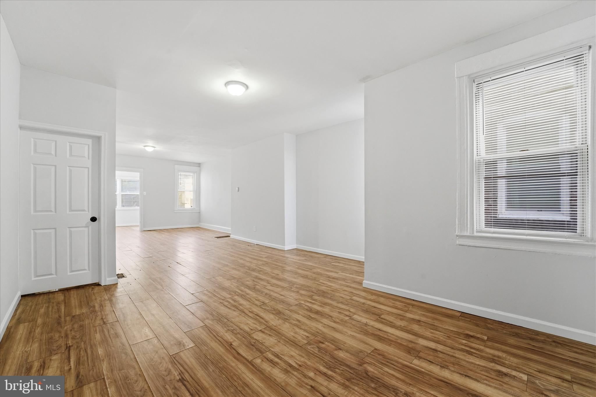 4009 Brown Street Philadelphia, PA 19104 - Photo 5 of 30 wooden floor in an empty room with a window