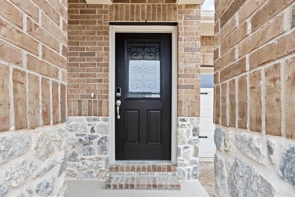 a view of a entryway door of the house