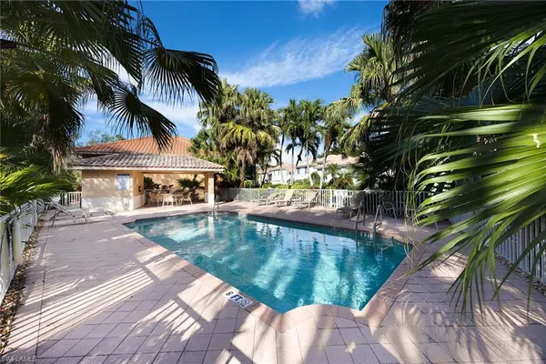 a view of a swimming pool with a garden