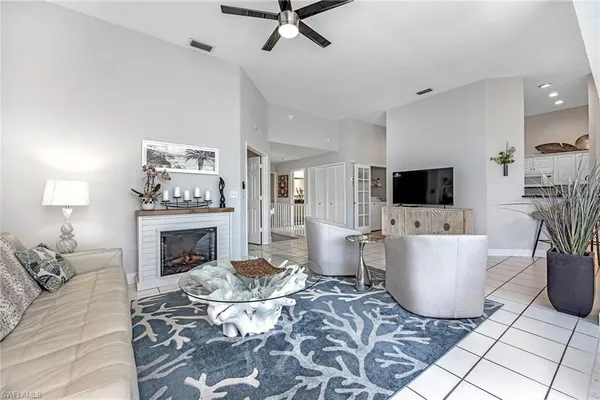 a living room with a couch and a flat screen tv
