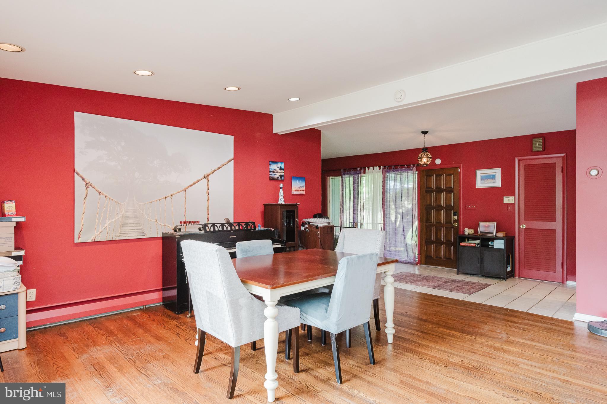 3228 Midfield Road Pikesville, MD 21208 - Photo 10 of 42 Vibrant dining space with artistic flair.