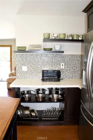 a view of a swimming pool with outdoor seating