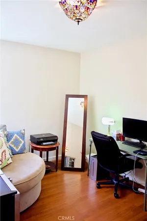 a workspace with furniture and a desk