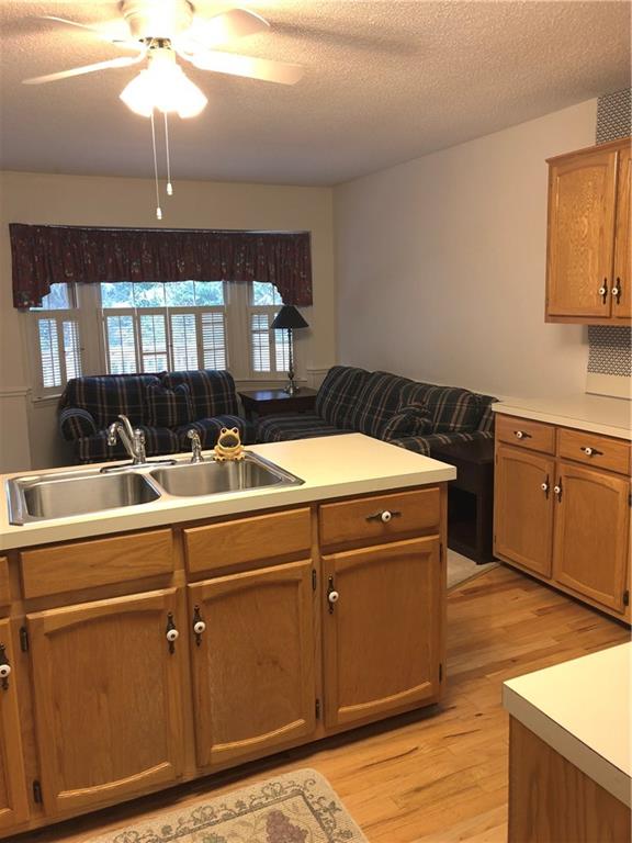 3788 Sandy Ford Road Hickory, NC 28602 - Photo 11 of 30 a room with a sink cabinets and chandelier