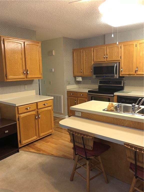 3788 Sandy Ford Road Hickory, NC 28602 - Photo 13 of 30 a kitchen with a sink cabinets and window