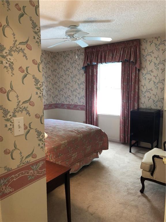 3788 Sandy Ford Road Hickory, NC 28602 - Photo 19 of 30 a bedroom with a bed and a window